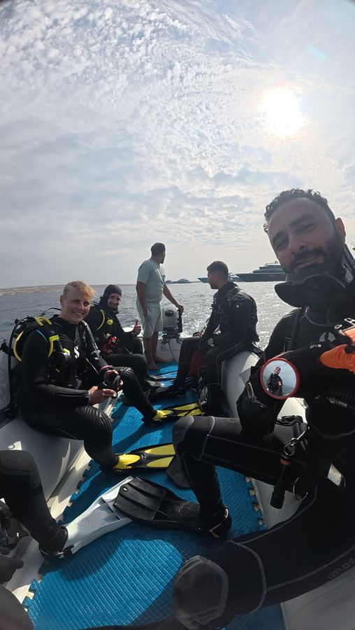 A group of divers and guests with Mahmoud on one of our trips.