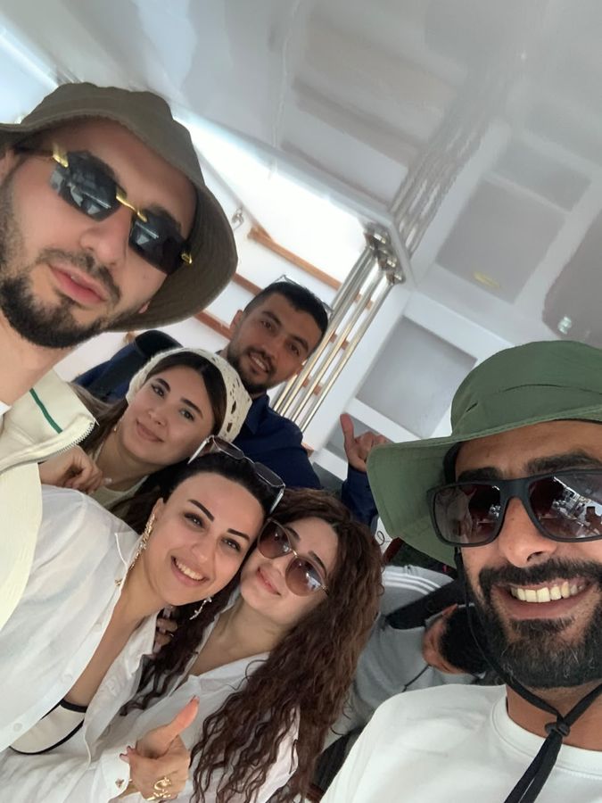 A group of divers and guests with Mahmoud on one of our trips.