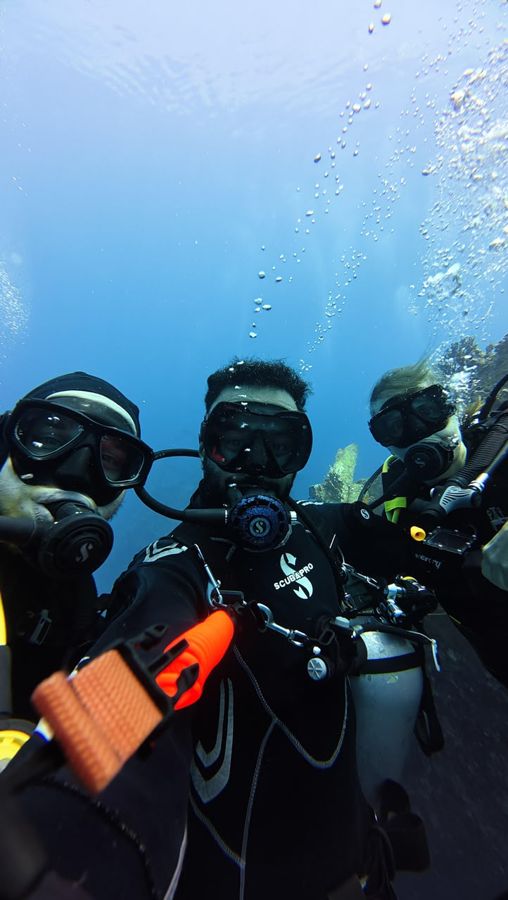 A group of divers and guests with Mahmoud on one of our trips.