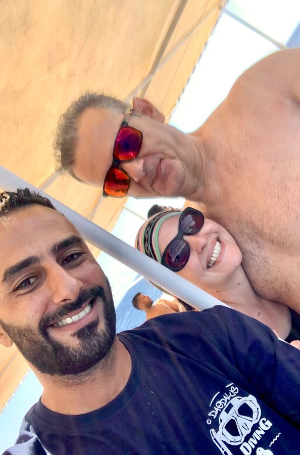 A group of divers and guests with Mahmoud on one of our trips.