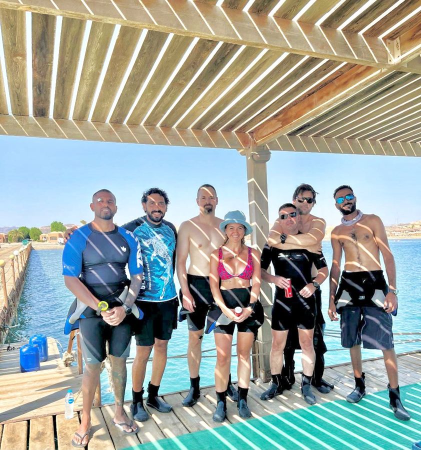 A group of divers and guests with Mahmoud on one of our trips.