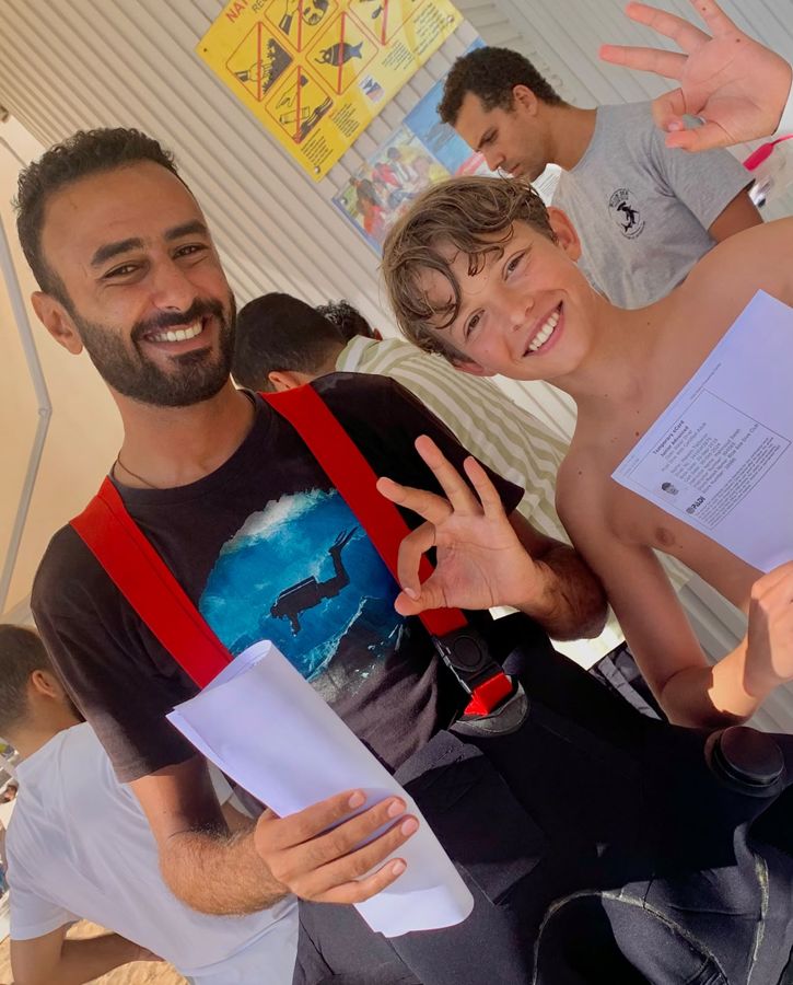 A group of divers and guests with Mahmoud on one of our trips.