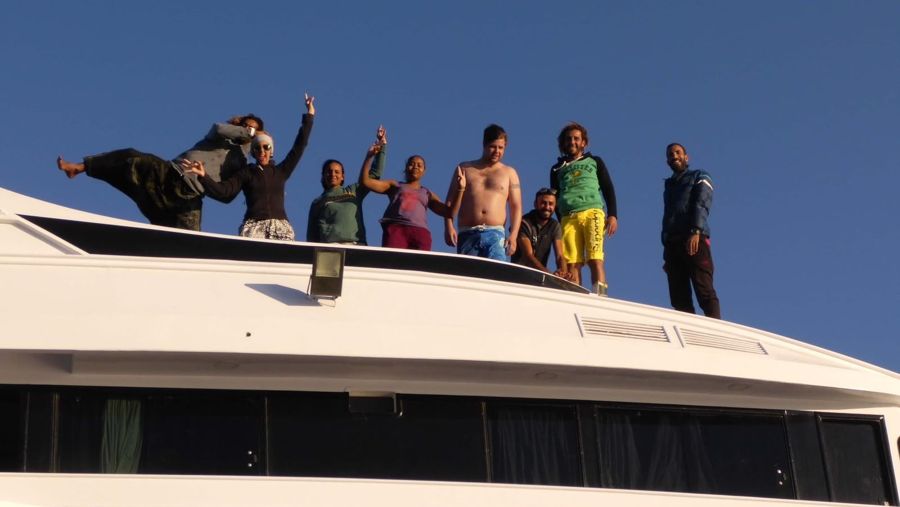 A group of divers and guests with Mahmoud on one of our trips.