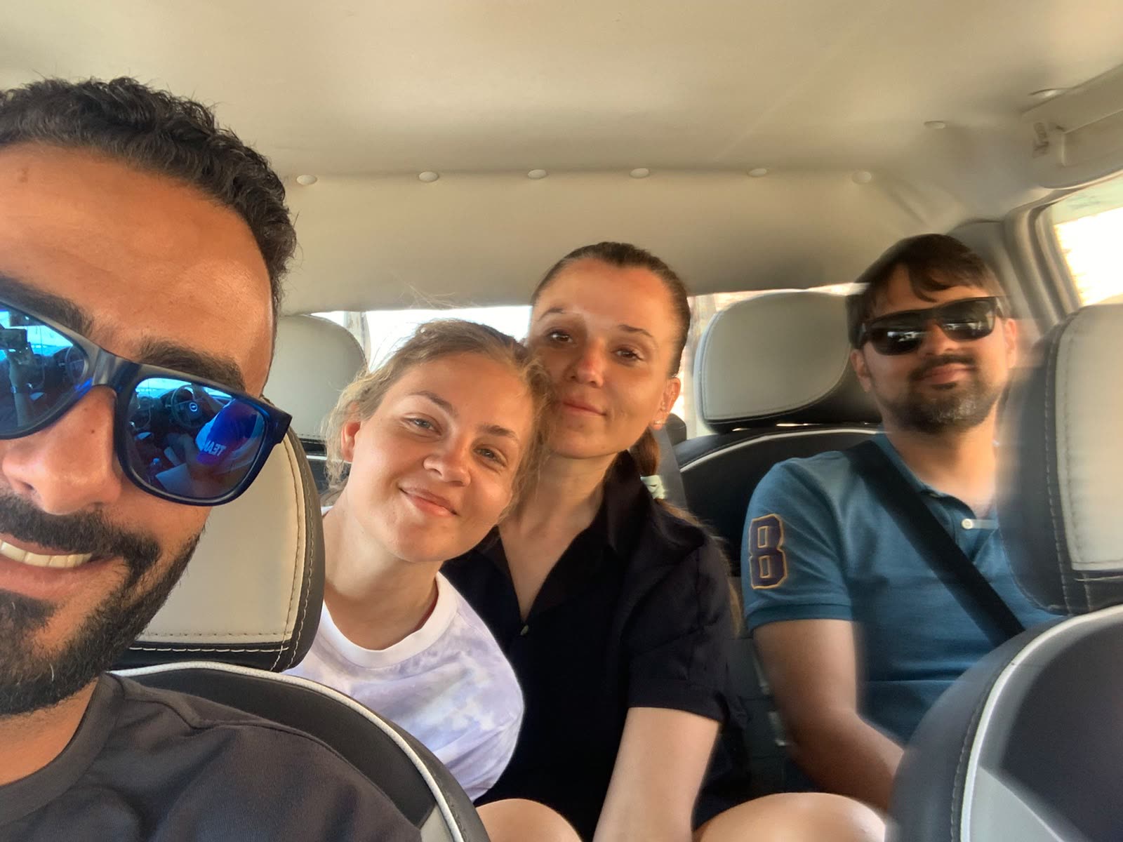 A selfie of the guide and three guests in the car on the drive to Dahab.